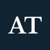 The initials AT against a black background.